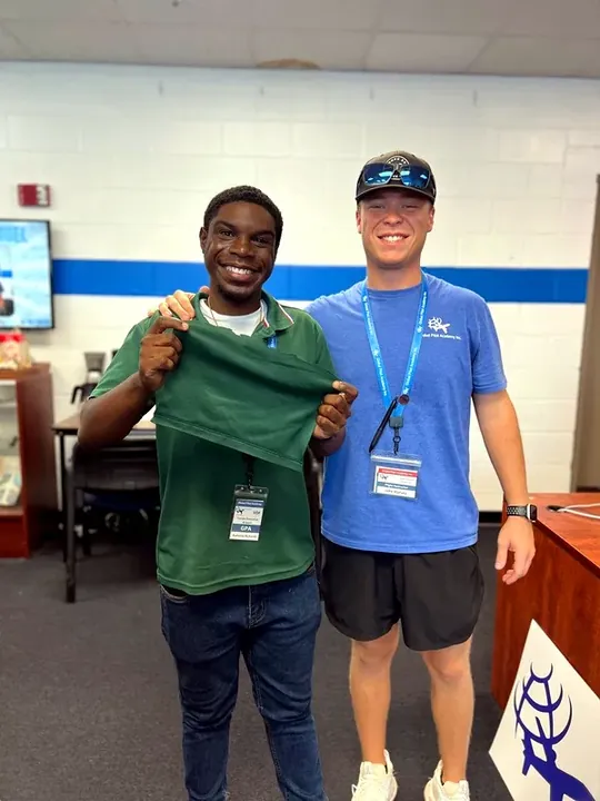 Student celebrating a passed FAA checkride
